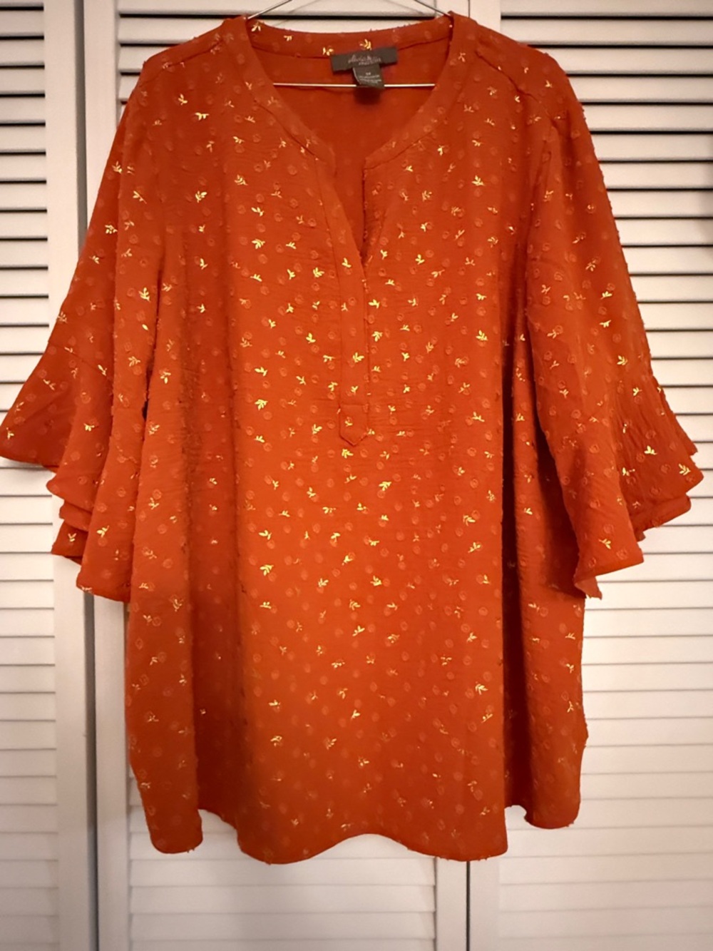 Orange Flutter-Sleeve Tunic Top with gold metallic accents.